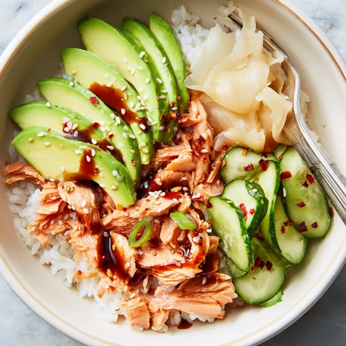 Quick and easy leftover salmon & rice bowl, perfect for a satisfying meal.