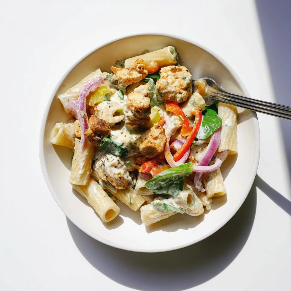 This creamy, flavorful Creamy Cajun Dirty Snow Chicken Pasta combines chicken, pasta, and healthy vegetables.