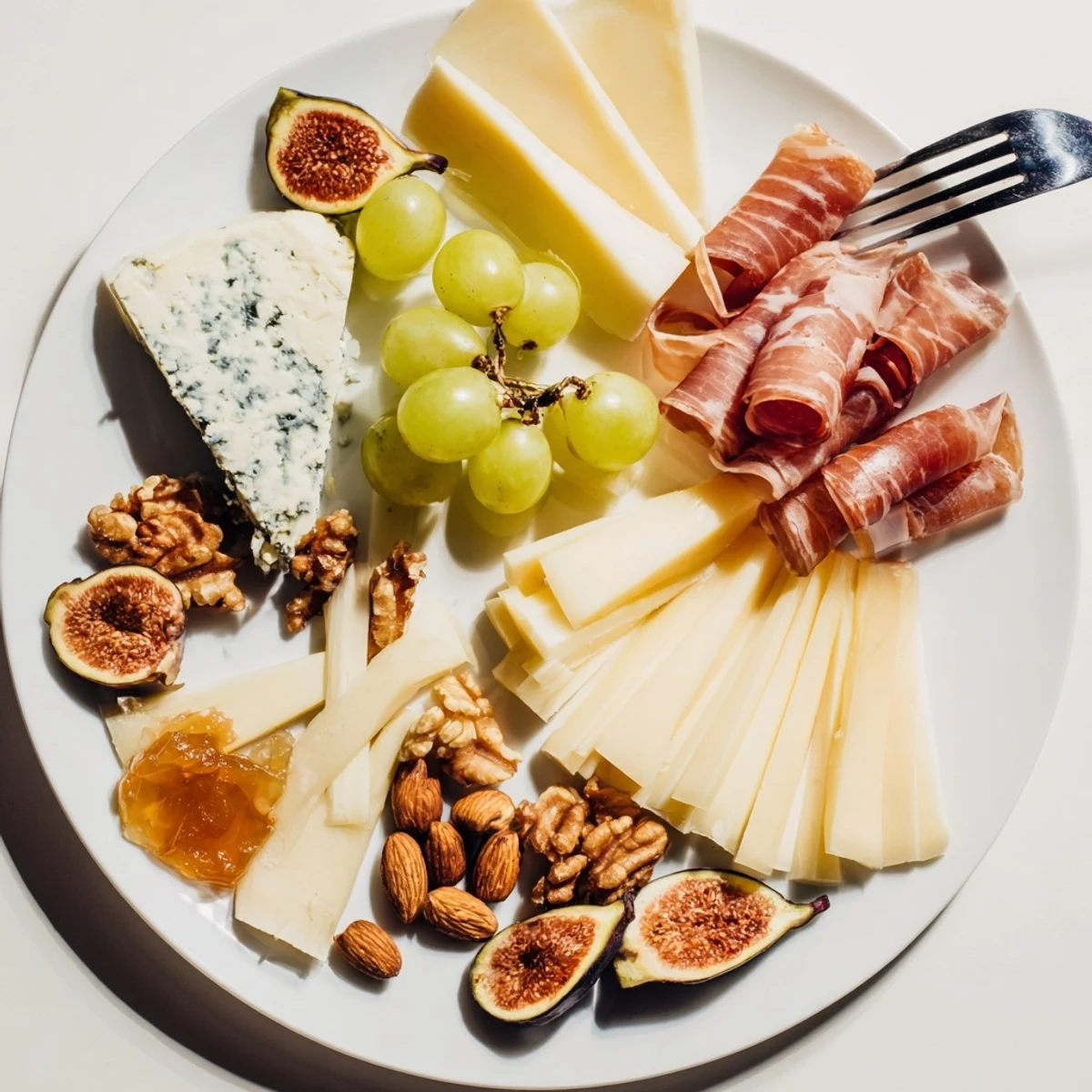 Elegantly arranged Wine & Food Pairing Platter featuring a colorful array of cheeses, meats, and crackers.