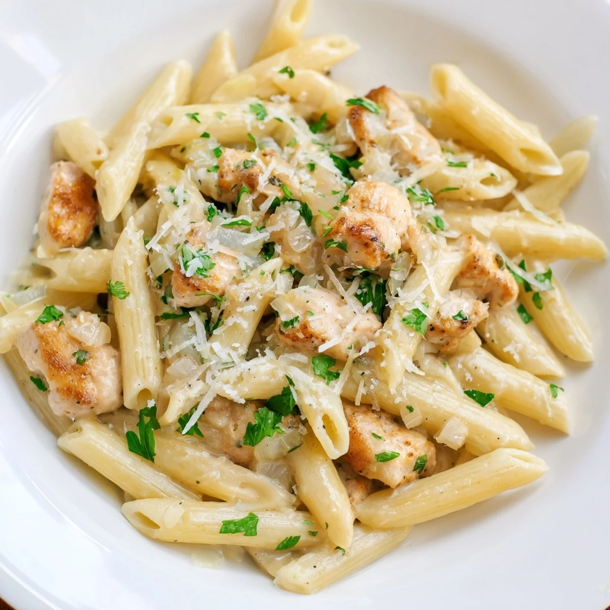 Quick Garlic Parmesan Chicken Pasta: A creamy, one-pan meal with golden chicken and al dente pasta.