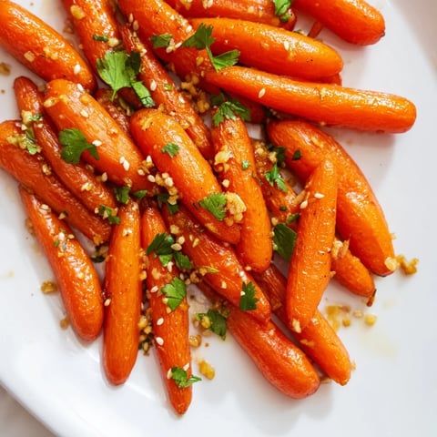 Golden-glazed Honey Soy Roasted Carrots, tender and glistening, ready to serve as a side.