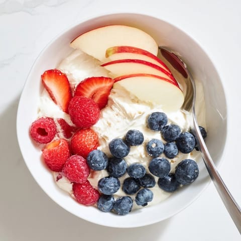 Homemade Greek Yogurt Fruit Dip recipe: a refreshing, tangy-sweet flavor with vibrant mixed berries.